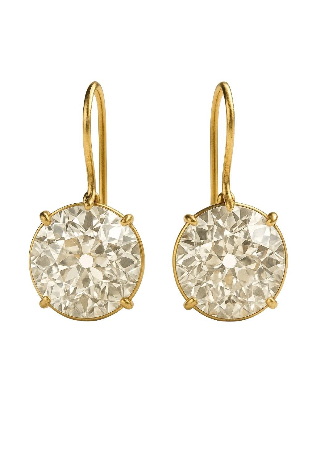 This stunning pair of antique diamonds totals approximately 4.21 carats.

Both stones are beautifully proportioned Old European cuts — highly sought after for their romantic faceting, open culets, and warm, candlelit brilliance.

One diamond is