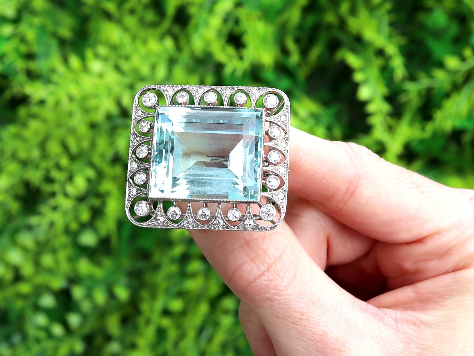 A stunning, fine and impressive antique 42.24 carat aquamarine, 1.62 carat diamond and platinum brooch / pendant; part of our antique aquamarine jewellery collections.

This stunning, fine and impressive 1920s brooch/pendant has been crafted in
