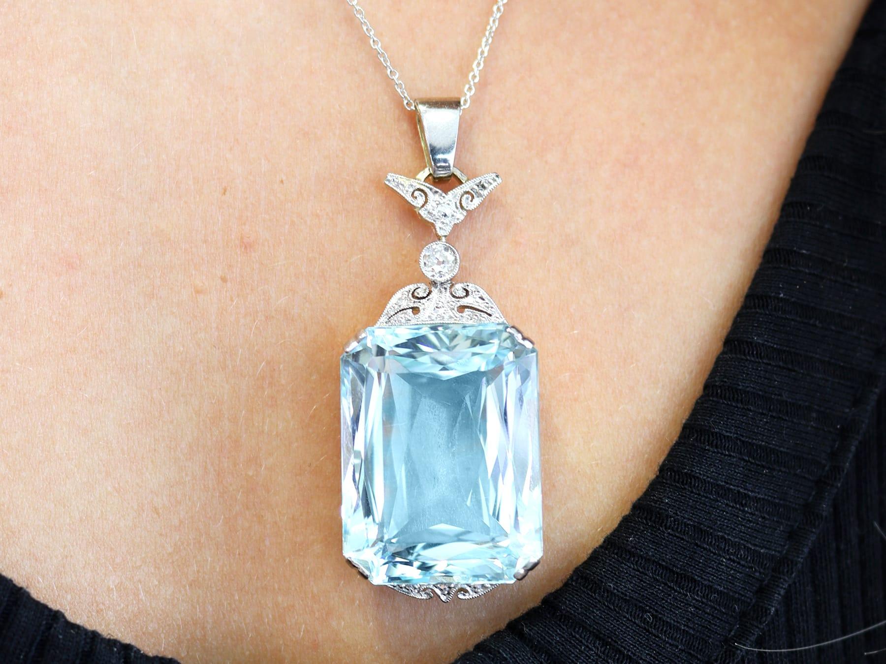 A stunning, fine and impressive antique 42.68 carat aquamarine and 0.16 carat diamond, 12 karat yellow gold and platinum set pendant; part of our diverse antique aquamarine jewellery collection.

This stunning, fine and impressive antique aquamarine