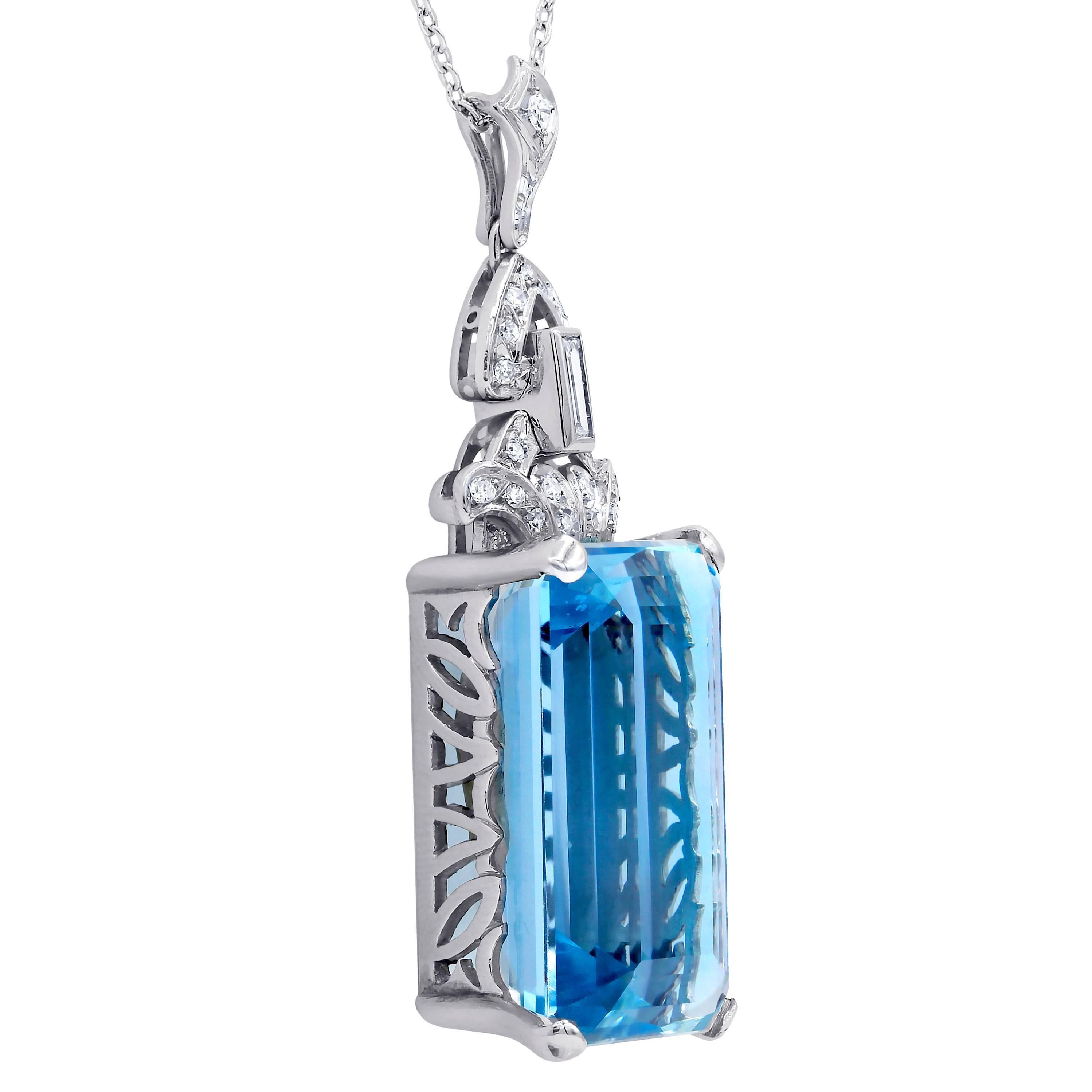 Finest quality aquamarine and diamond pendant features 42.80 Carats Aquamarine, fine color and clarity, set with 0.50 carats of micro pave round diamonds. 
