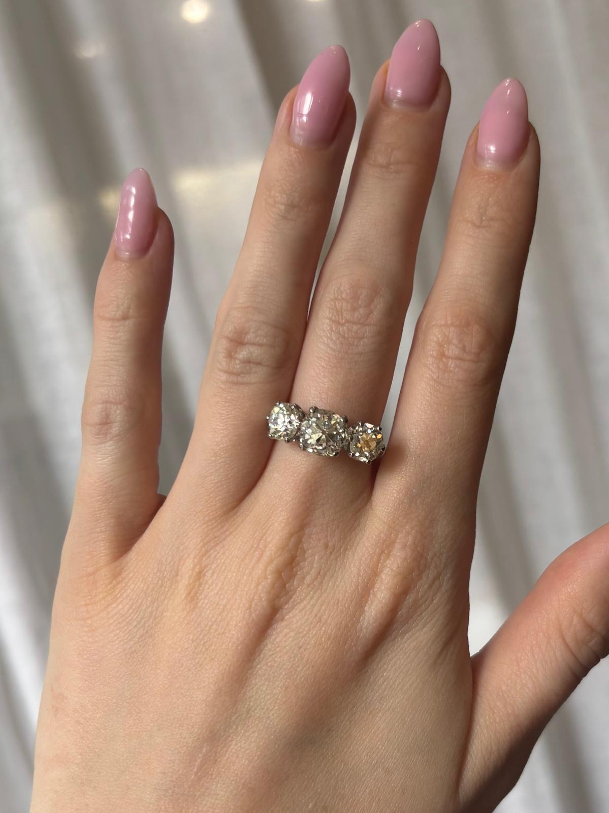 Antique 4.33ct Old Mine Cut Diamond Three Stone Ring in 18k White Gold in vendita 4