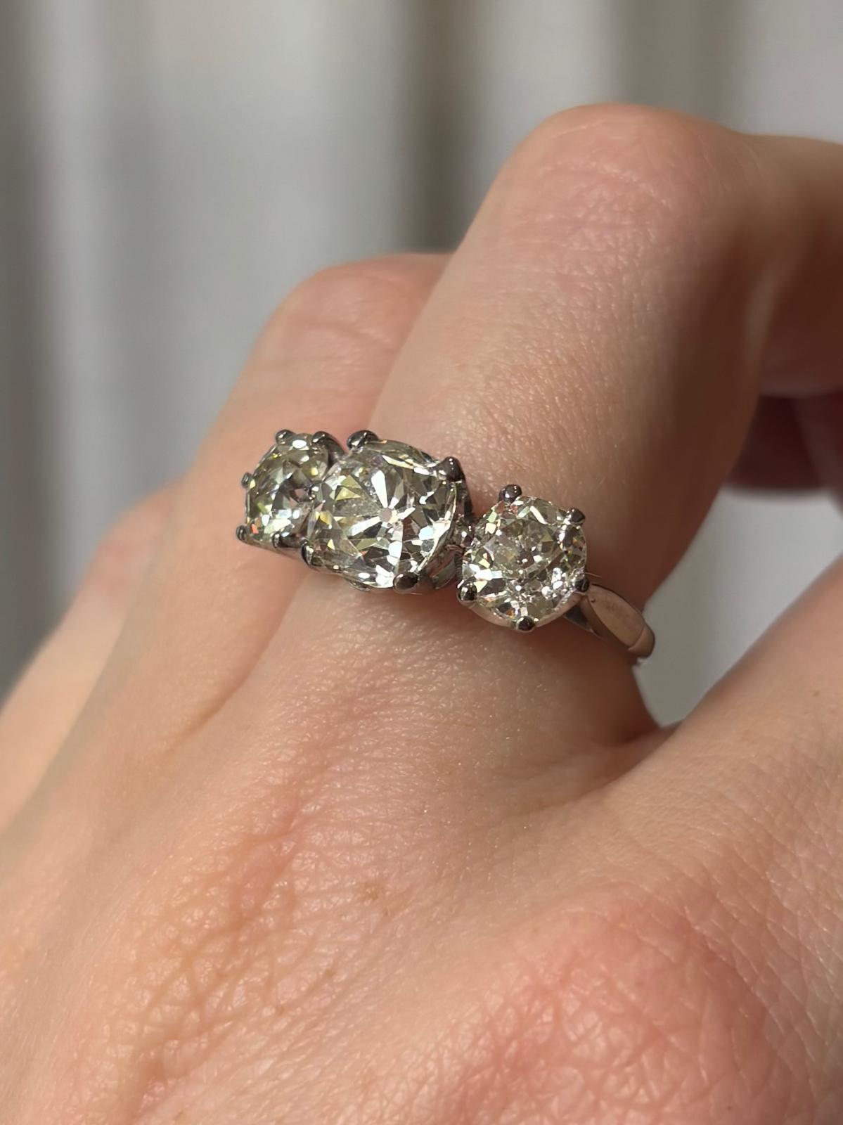 Antique 4.33ct Old Mine Cut Diamond Three Stone Ring in 18k White Gold in vendita 5