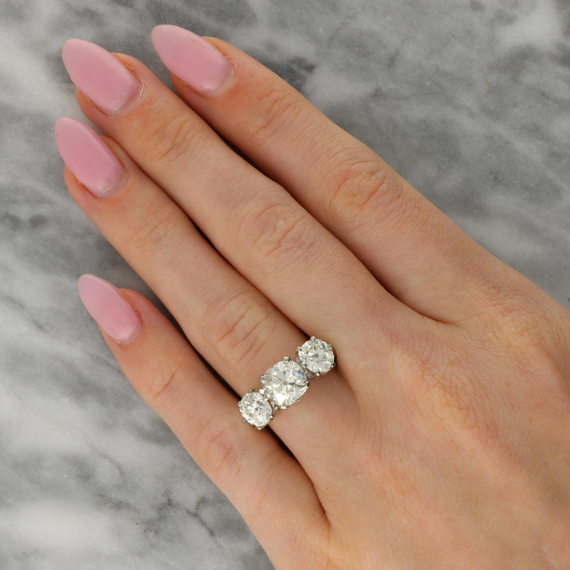 Antique 4.33ct Old Mine Cut Diamond Three Stone Ring in 18k White Gold in vendita 3