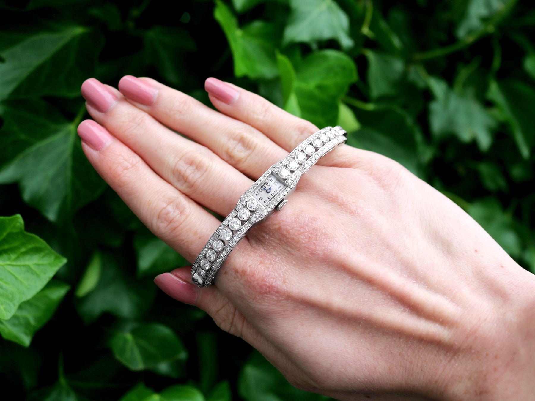 A stunning, fine and impressive antique 4.35 carat diamond, 18 karat white gold and platinum French cocktail watch; part of our antique watch and diamond jewellery collections

This stunning, fine and impressive antique diamond cocktail watch has