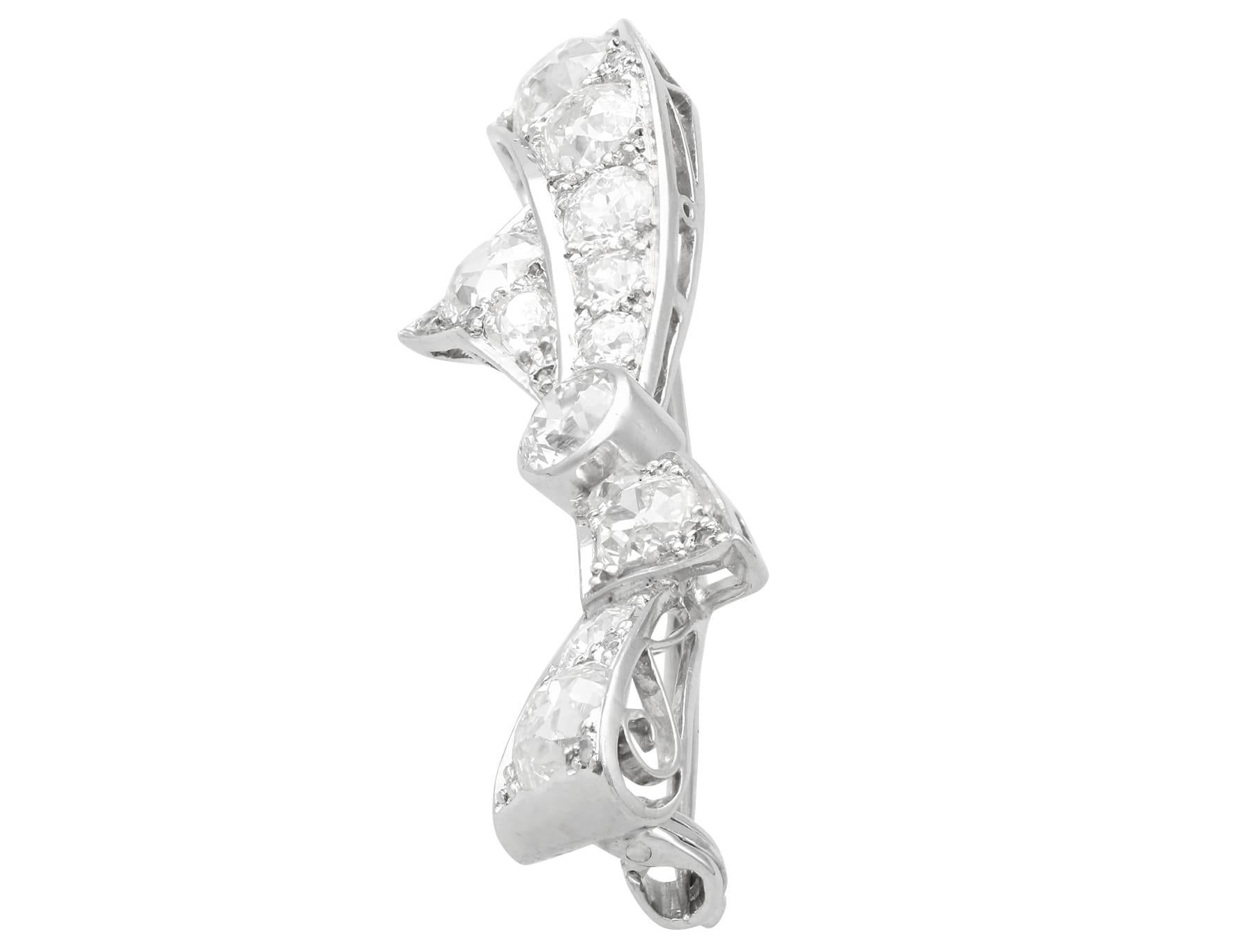 Old European Cut Antique 4.45ct Diamond and Platinum Bow Brooch For Sale