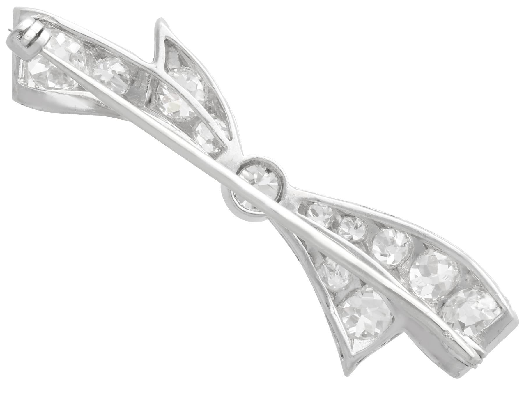 Women's or Men's Antique 4.45ct Diamond and Platinum Bow Brooch For Sale