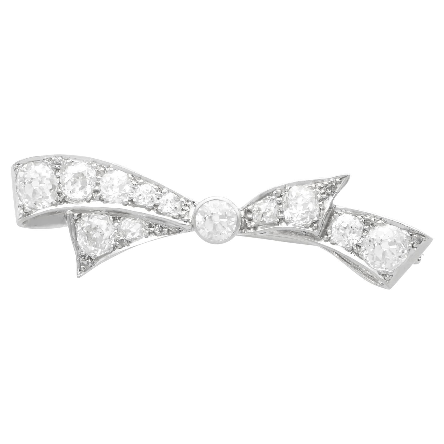 Antique 4.45ct Diamond and Platinum Bow Brooch For Sale
