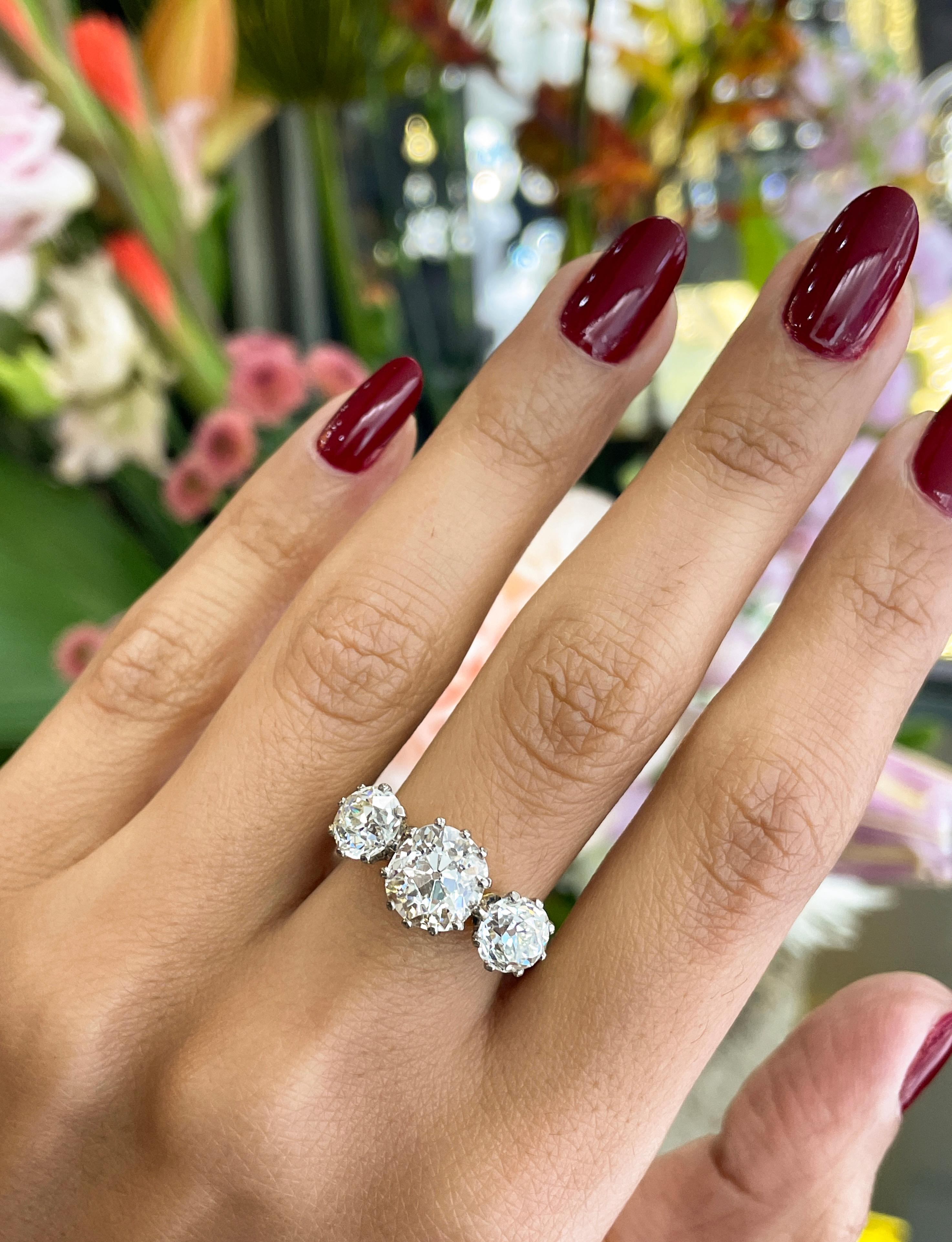 Women's Antique 4.61 Carat Old Cut Diamond Three-Stone 18 Carat Gold Engagement Ring For Sale