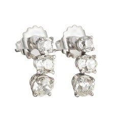 Antique 4.68 Carat Triple Old Mine Cushion Cut Diamond Platinum Dangle Earrings