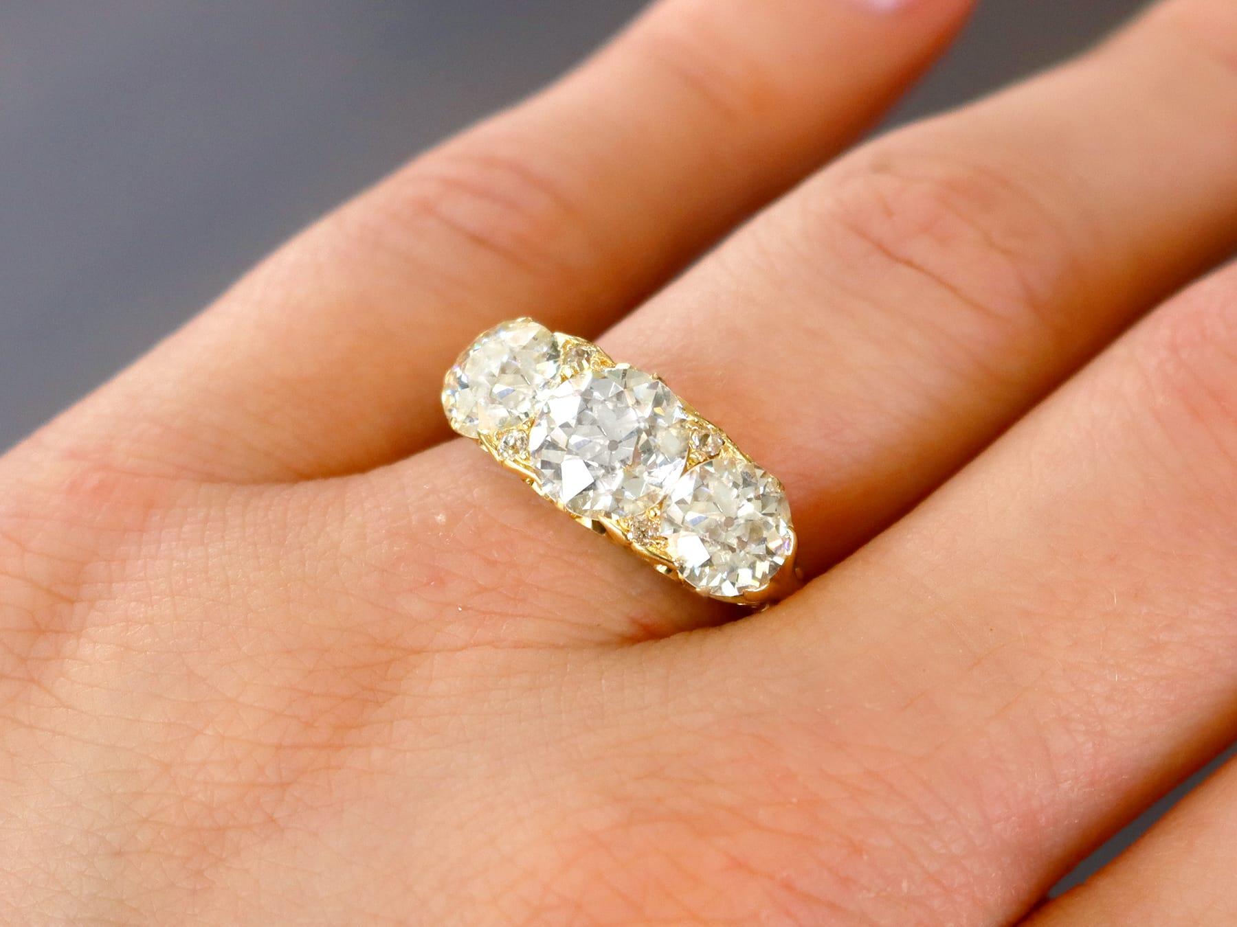 Old European Cut Antique 4.76 Carat Diamond and 18k Yellow Gold Trilogy Ring Circa 1900 For Sale