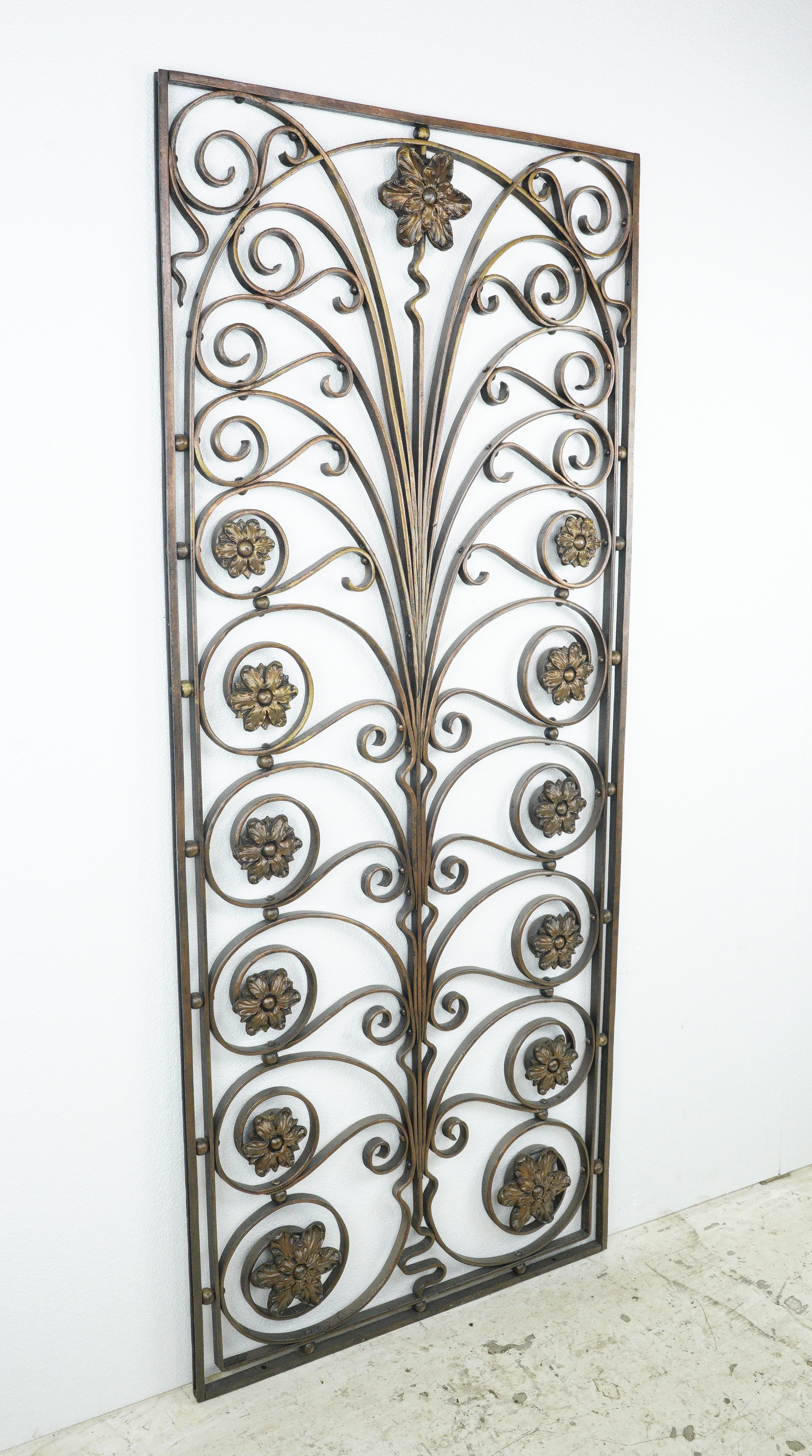 Antique wrought iron swirl and floral wrought iron window guard from the United Charities Building formerly located at 287 Park Avenue South. Designed by R. H. Robertson of Rowe & Baker fame, the United Charities Building was built in 1893 in the