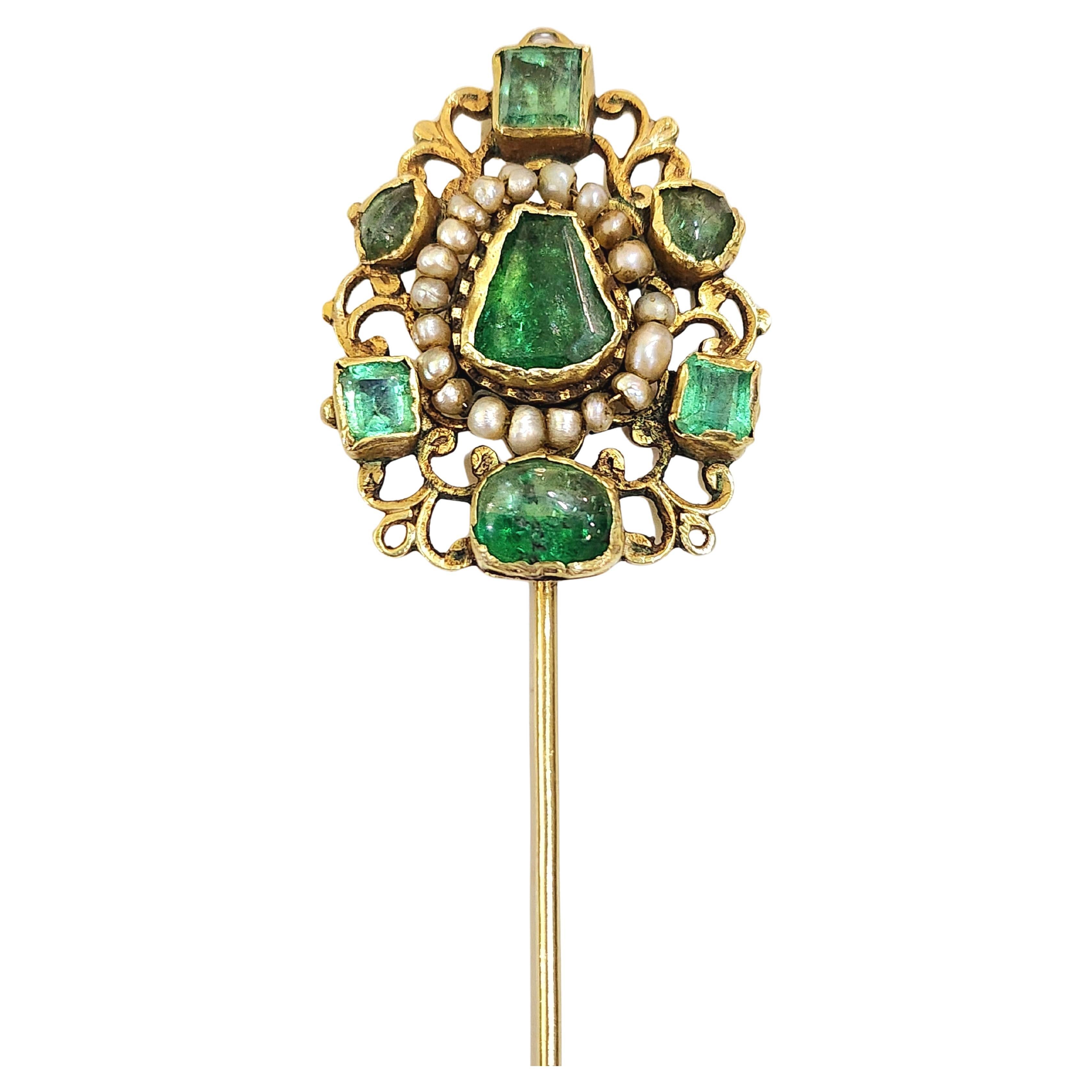 Early 19th century 14k gold large pin with natural green emeralds estimate weight 5 to 6 carats cobochon cut and faceted cut flanked with seed pearls pin lenght 10cm 
