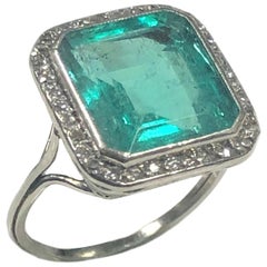 Antique 5 Carat Step Cut Columbian Emerald Platinum and Diamond Ring GIA