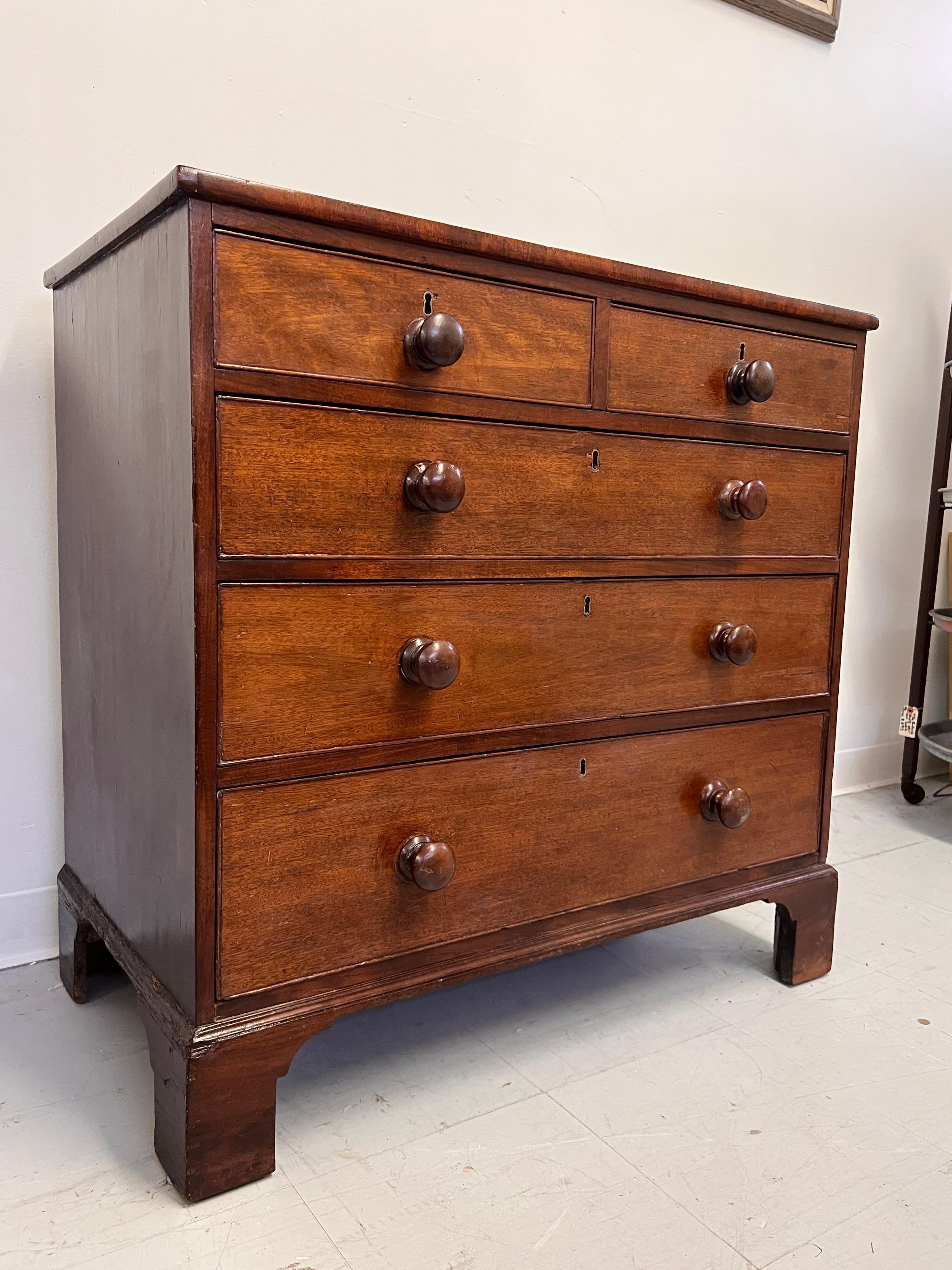 This English dresser is a fine example of mid to late 19th-century design, reflecting the elegance and functionality of the Georgian period. Constructed from rich hardwoods like mahogany or oak, it features a warm finish that accentuates the natural