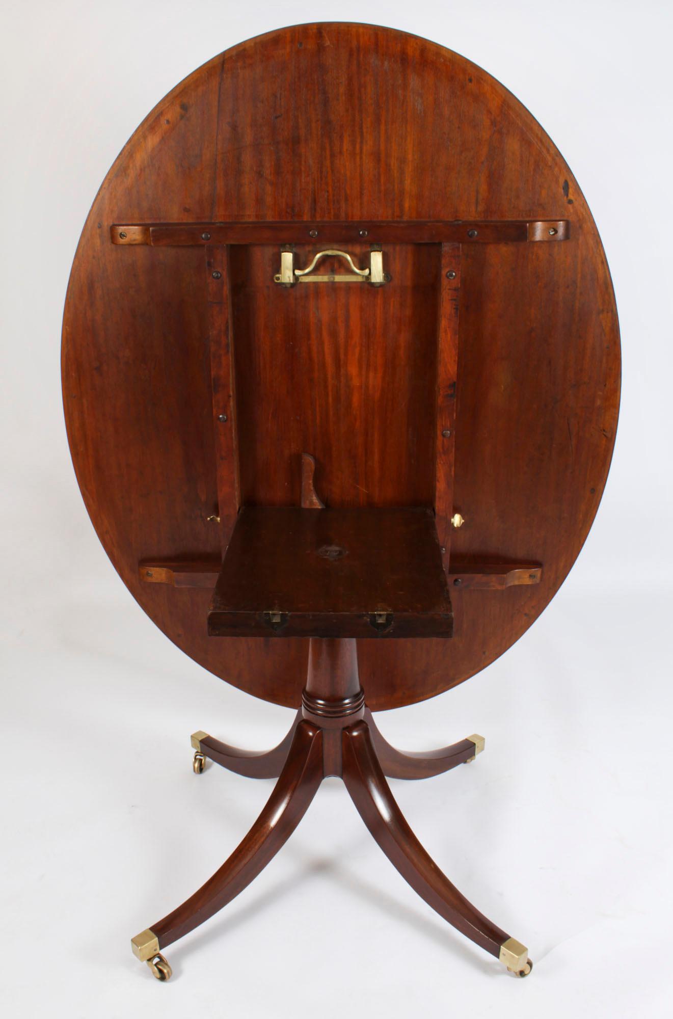 Antique Oval Mahogany Tilt Top Dining Table, Early 20th Century 8