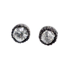 Antique .50 carat diamond 14k rose gold and silver stud earrings