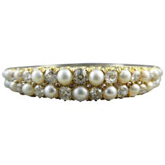 Antique 5.0 Carat Diamond and Natural Pearl Bangle, circa 1890s, 18 Carat Gold