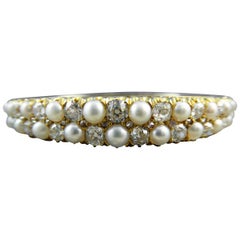 Antique 5.0 Carat Diamond and Natural Pearl Bangle, circa 1890s, 18 Carat Gold