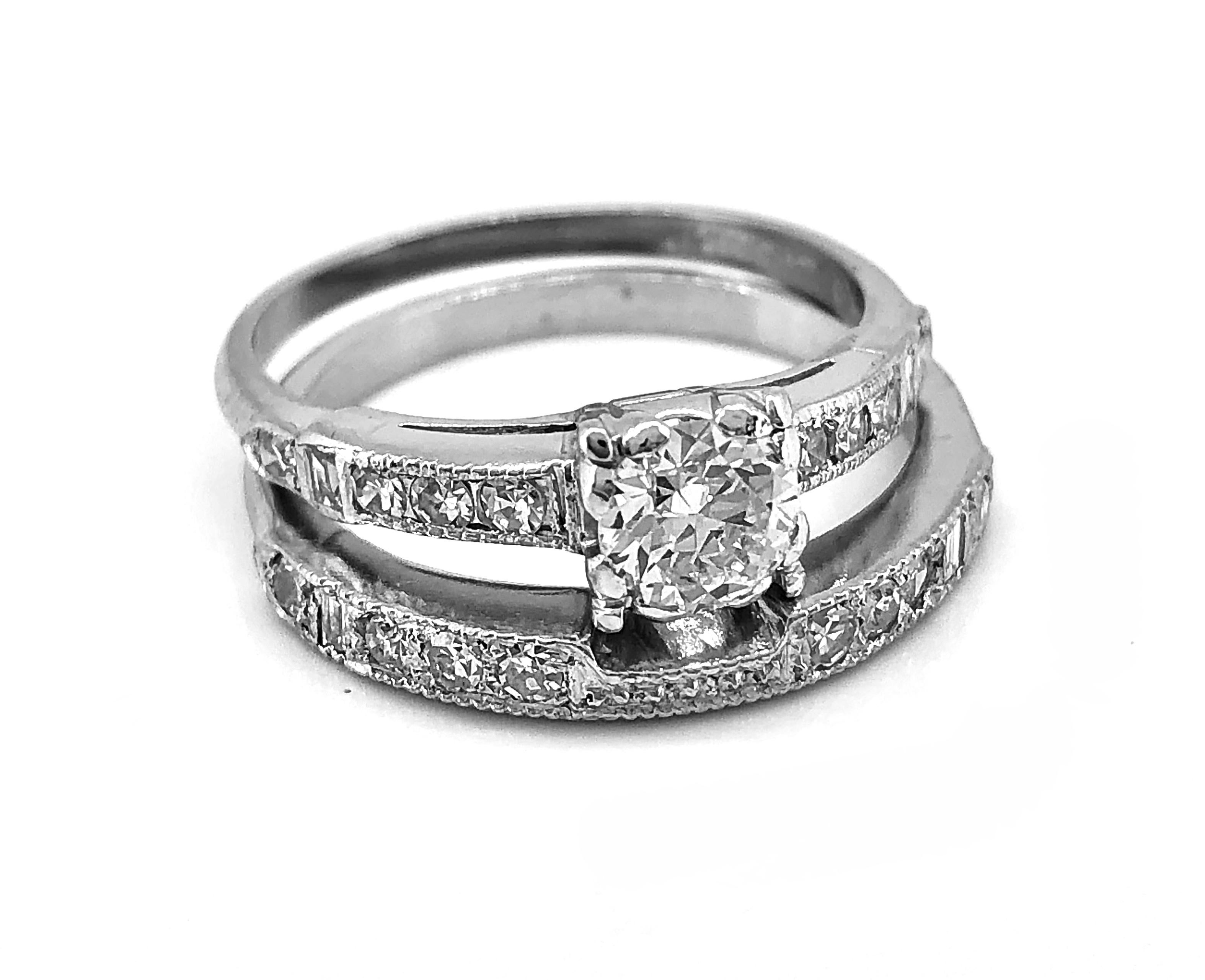 An ultra feminine Art Deco diamond Antique engagement ring/wedding set, crafted in platinum, featuring a .50ct. apx. European cut diamond with VS2 clarity and G color. Accenting the center stone on the shoulders of the ring and on the band are