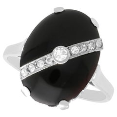 Antique 5.10 Carat Black Onyx and 0.18 Carat Diamond, 14 Karat White Gold Ring