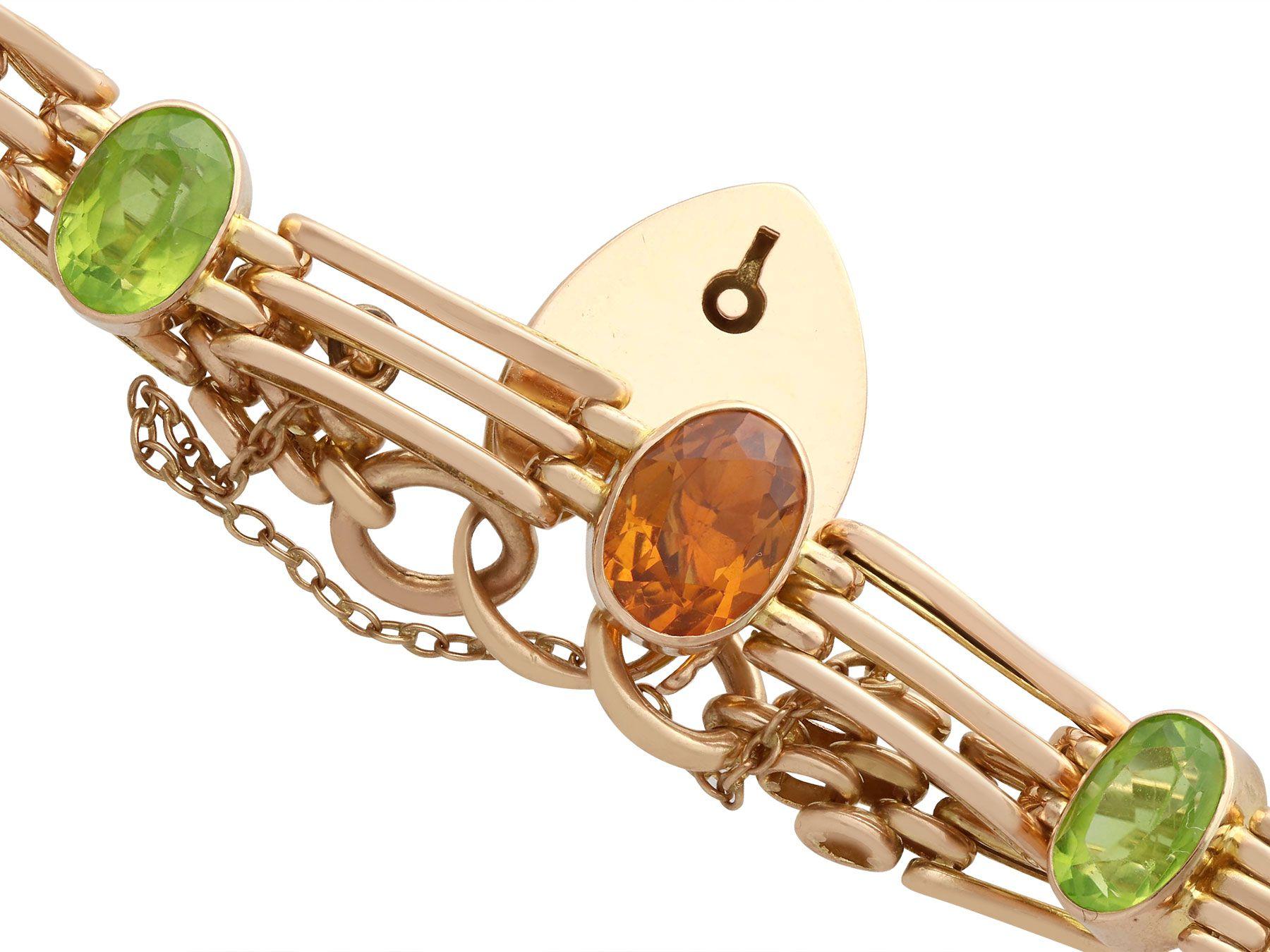 Oval Cut Antique 5.19 Carat Citrine and 3.72 Carat Peridot Yellow Gold Gate Bracelet For Sale