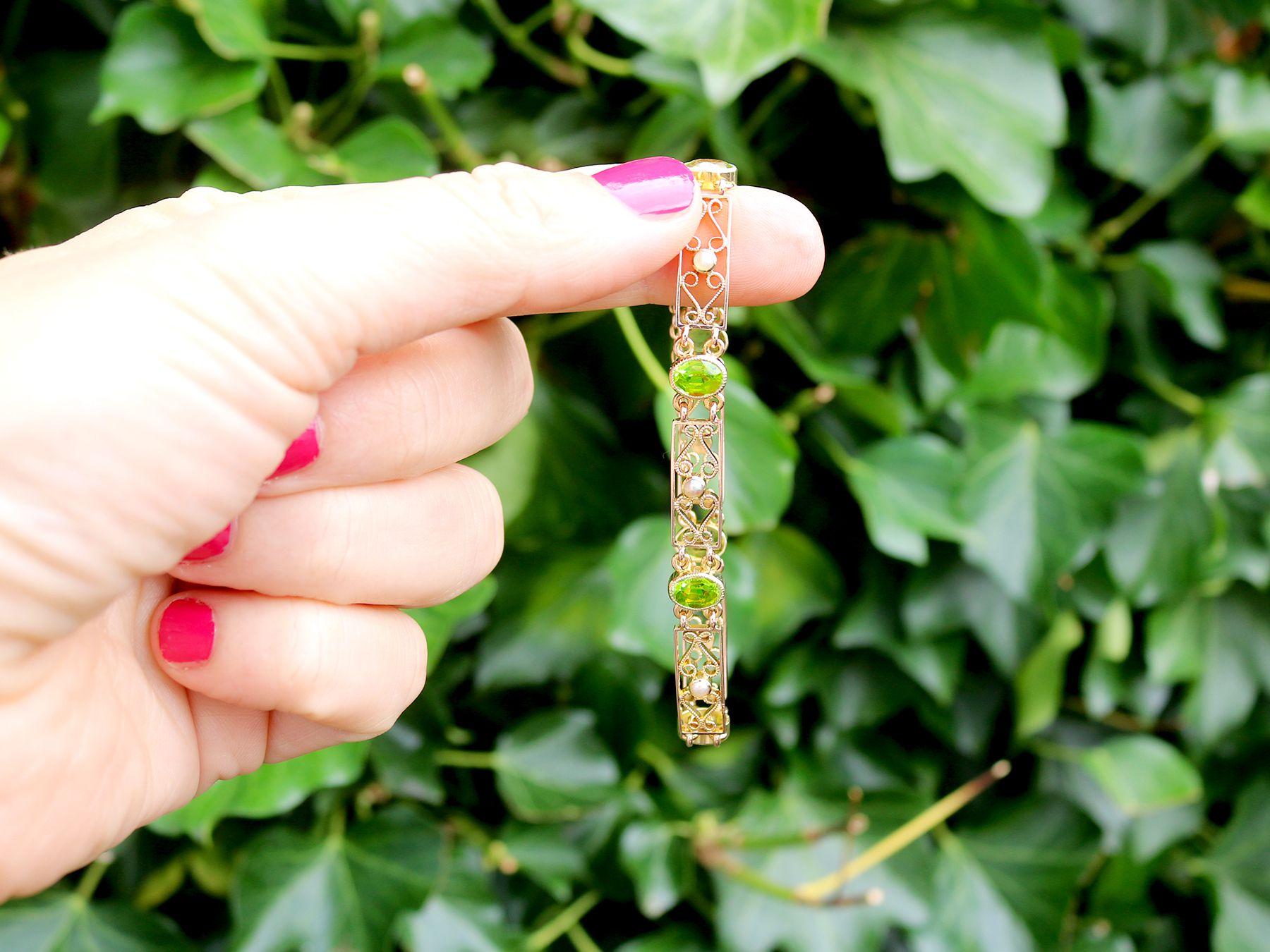 A stunning, fine and impressive 5.34 Carat peridot and seed pearl, 15 karat yellow gold bracelet; part of our diverse antique jewelry and estate jewelry collections.

This stunning, fine and impressive antique bracelet has been crafted in 15k yellow