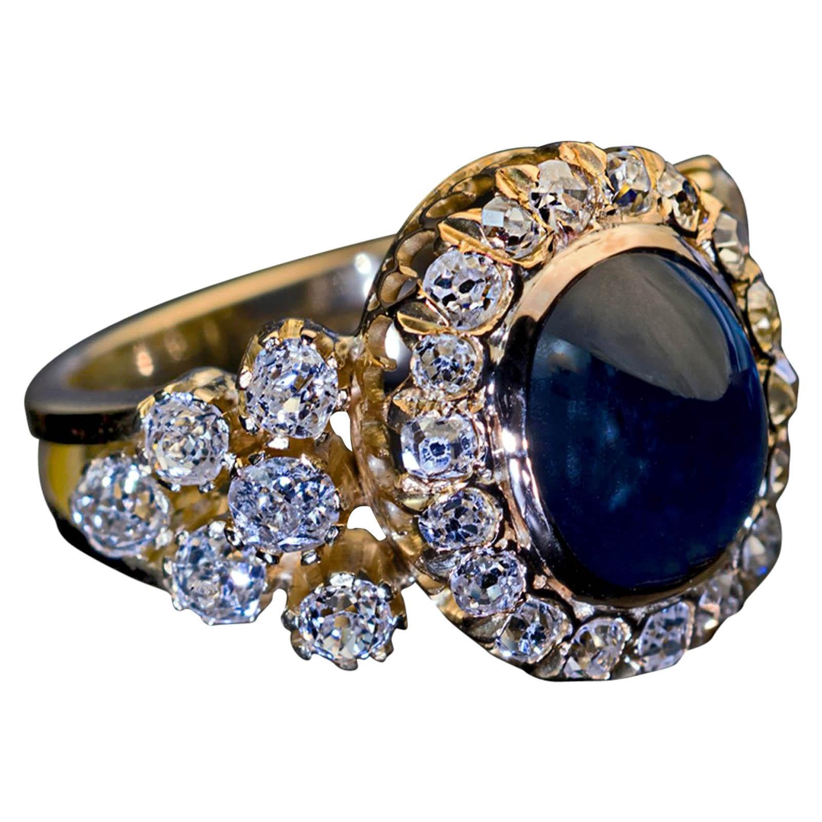 Antique 5.37 Carat Cabochon Sapphire 2.60 Carat Diamond Gold Cluster Ring