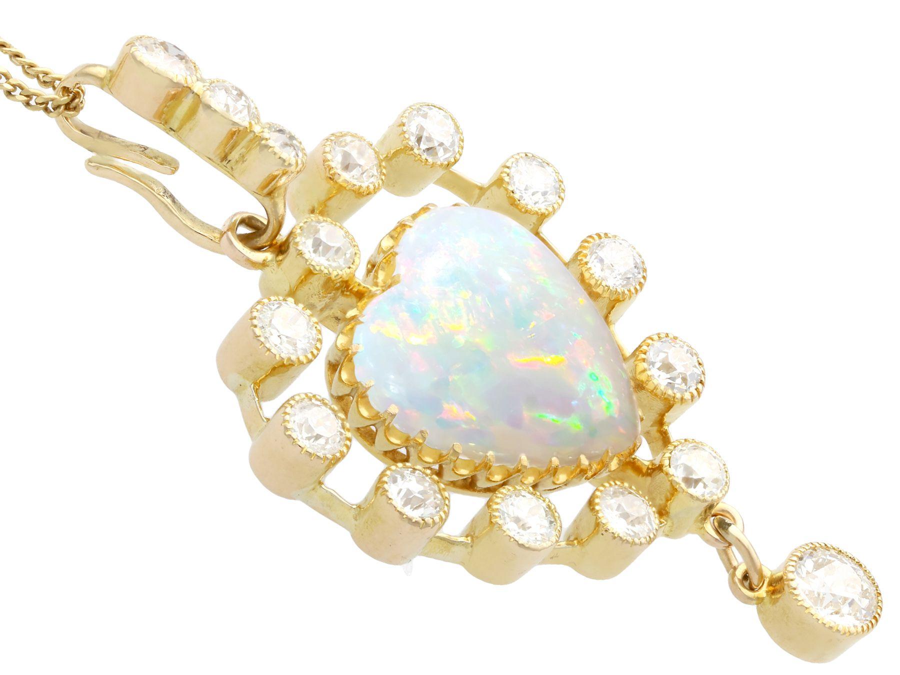 Cabochon Antique 5.48 Carat Opal and 2.91 Carat Diamond 15k Yellow Gold Heart Pendant For Sale