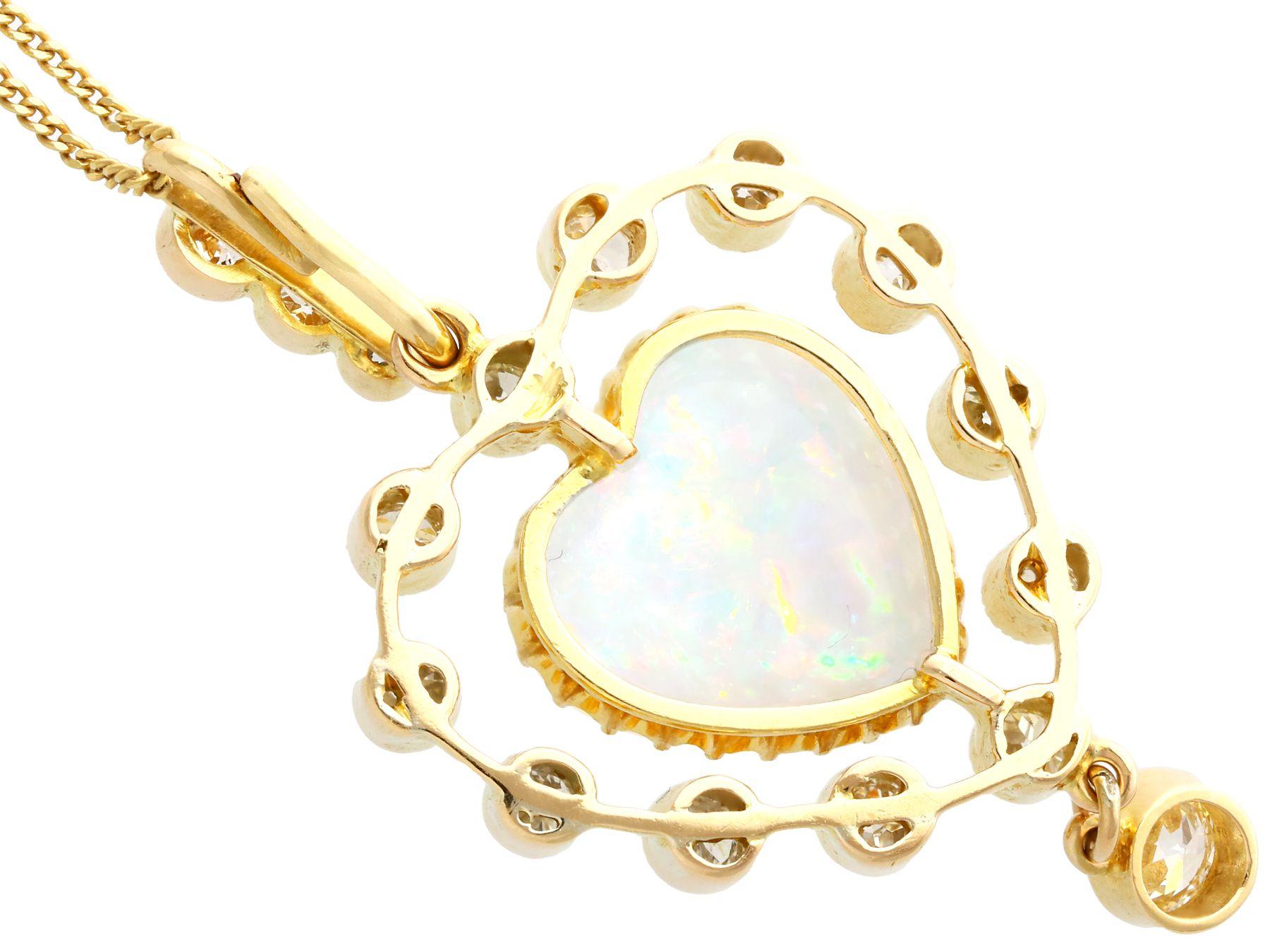 Antique 5.48 Carat Opal and 2.91 Carat Diamond 15k Yellow Gold Heart Pendant In Excellent Condition For Sale In Jesmond, Newcastle Upon Tyne