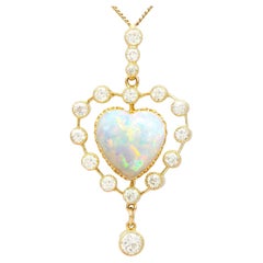 Antique 5.48 Carat Opal and 2.91 Carat Diamond 15k Yellow Gold Heart Pendant