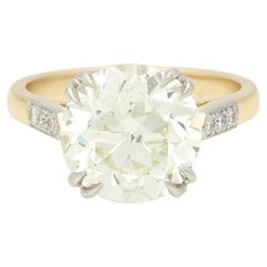Bague solitaire en or 18k et platine avec diamant taille ancienne de 5,50ct