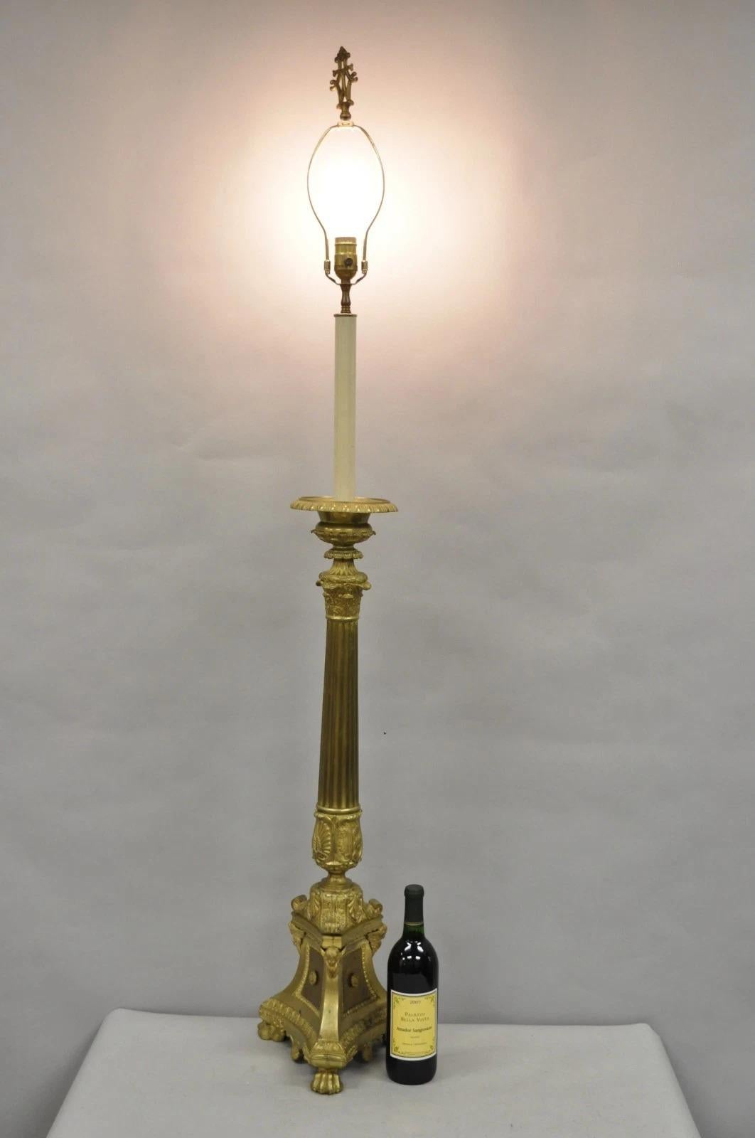 Very Tall Antique French Empire Renaissance Revival Grand Tour Gilt Bronze Column Candlestick Table Lamp with Winged Cherubs and Paw Feet. Circa Early 20th Century. Measurements: 59