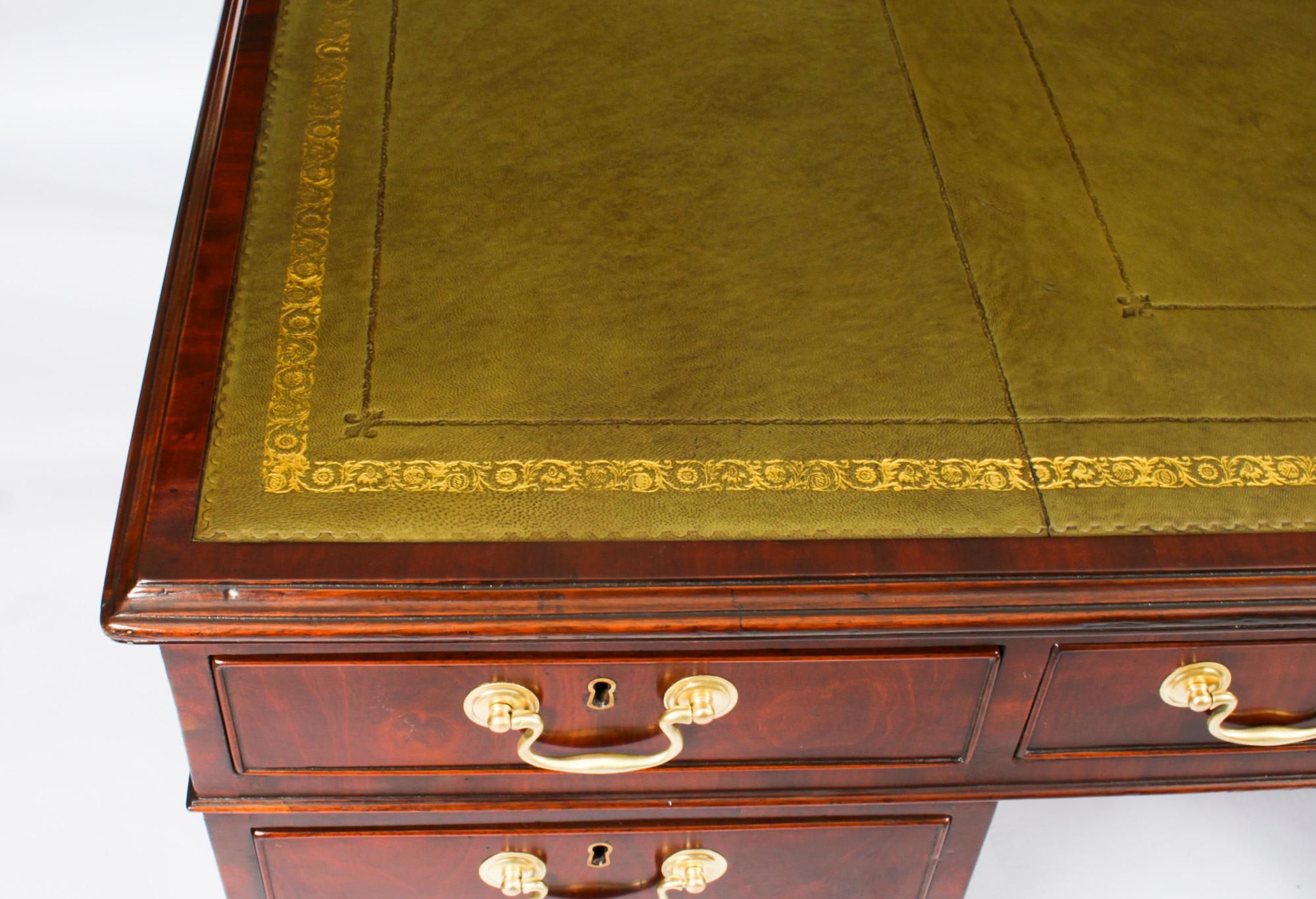 This is a beautiful antique George III mahogany partners pedestal desk, dating from the Circa 1810.
 
The rectangular top features an inset green and gilt tooled leather writing surface, above three frieze drawers on each side. There are a further