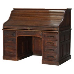 Antique 60” Oak S-Roll Top & Raised Panel Desk with 22 Interior Drawers, c1920