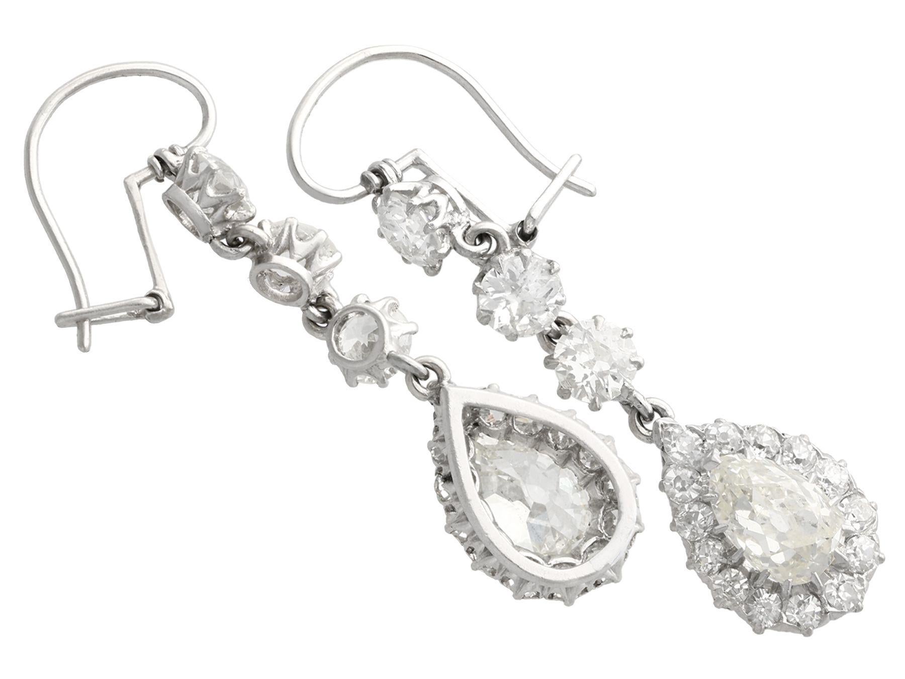 A stunning, fine and impressive pair of antique 6.22 carat diamond and platinum earrings; part of our diverse diamond jewelry and estate jewelry collections

These stunning antique earrings have been crafted in platinum.

Each earring has a feature