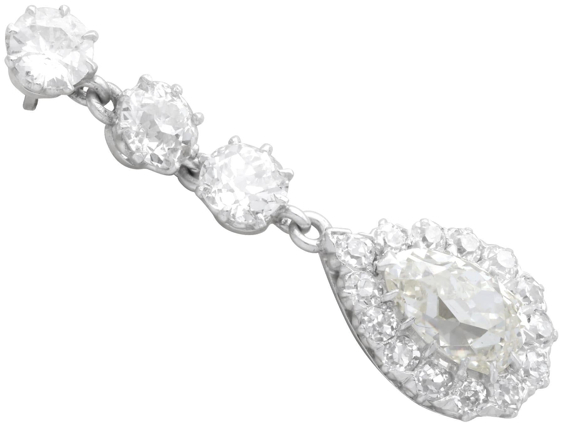 Pear Cut Antique 6.22ct Diamond and Platinum Drop Earrings For Sale