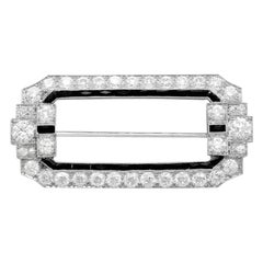 Antique 6.29 Carat Diamond and Onyx Platinum Brooch