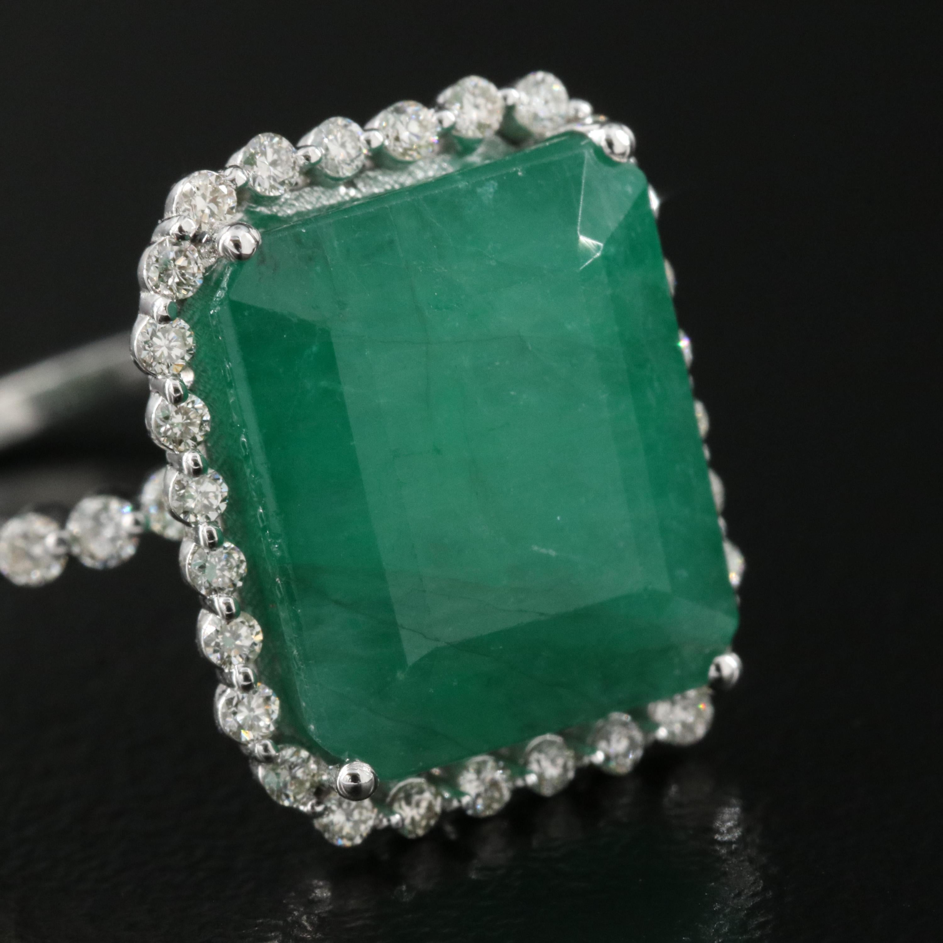 Antique Certified 7 Carat Natural Emerald and Diamond White Gold Engagement Ring

A stunning ring featuring IGI/GIA Certified 7 Carat Natural Emerald and 0.37 Carat of Diamond Accents set in 18K Solid Gold.

Emeralds are highly valued for their