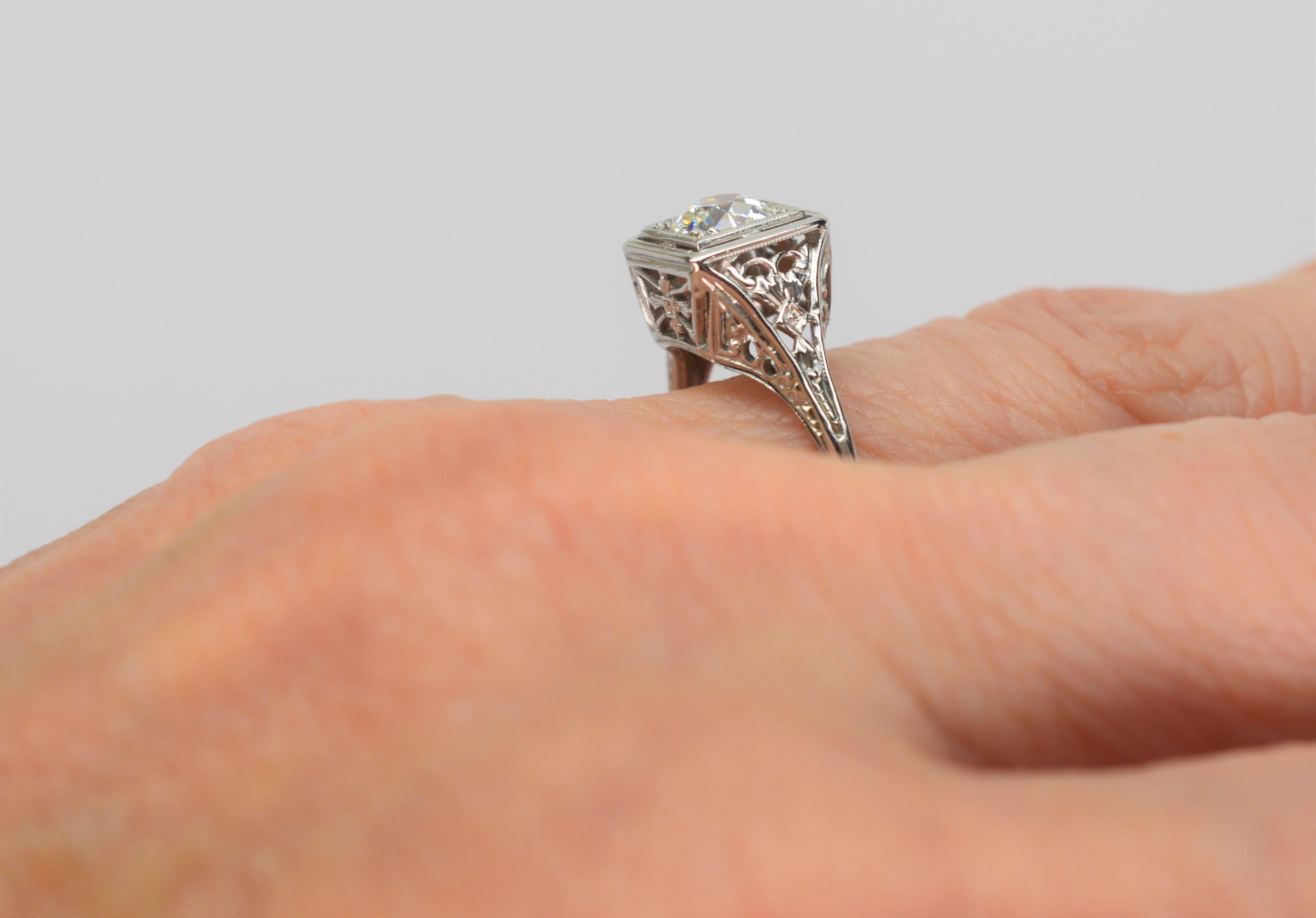 Women's Antique .70 Carat Solitaire Miners Cut Diamond 18 Karat White Gold Ring For Sale