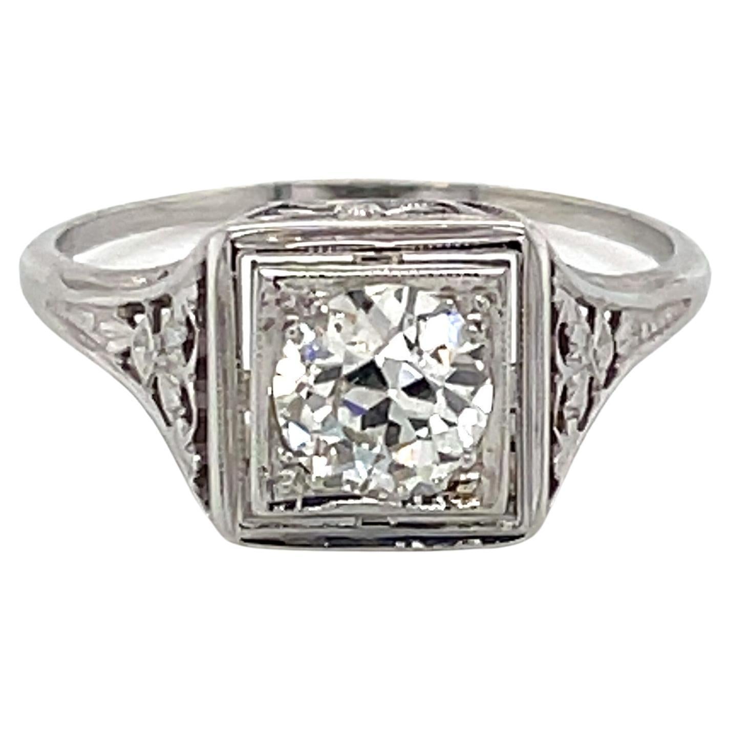 Antique .70 Carat Solitaire Miners Cut Diamond 18 Karat White Gold Ring For Sale