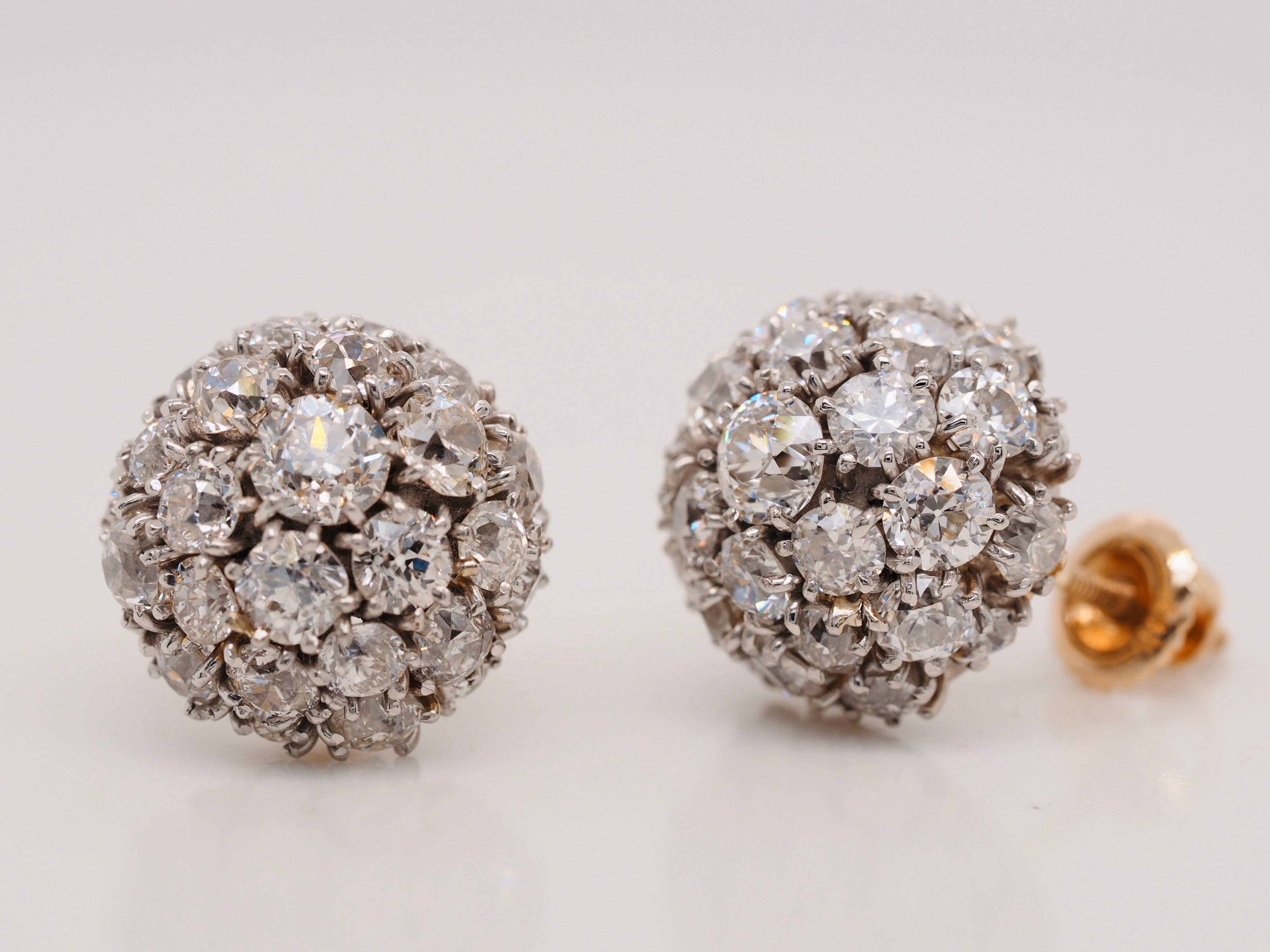 These incredible dome shaped vintage diamond earrings are illuminating with 7.00CTW carats of old European cut diamonds. The diamonds vary from 2 to 4mm in size. Each stone is individually prong set sitting on a layer of platinum giving it the