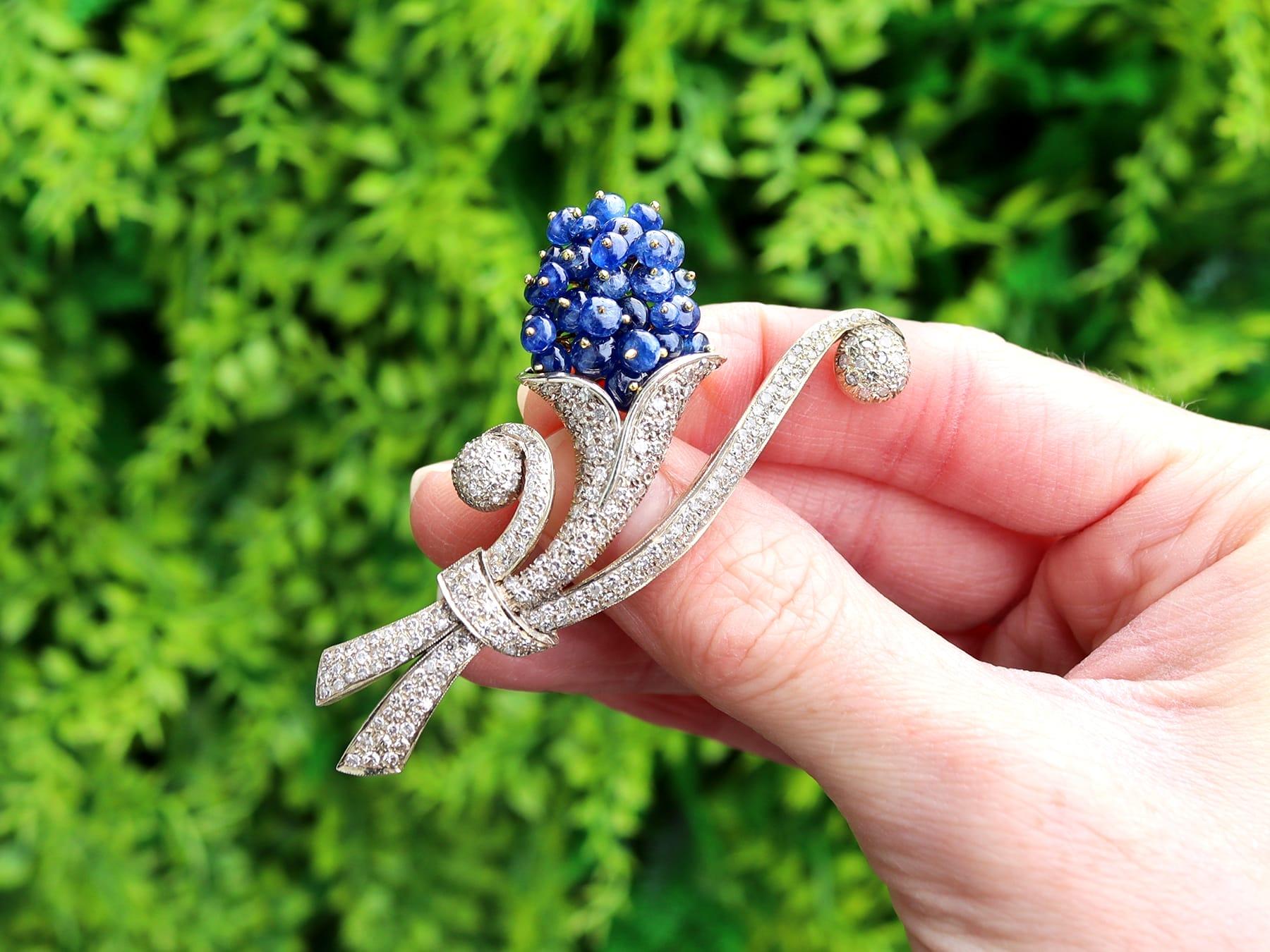 A stunning, fine and impressive antique 7.20 carat sapphire and 2.91 carat diamond, 15 karat yellow gold and silver set brooch; part of our diverse 1920s sapphire jewelry collection.

This stunning, fine and impressive sapphire brooch has been