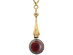 Antique 7.90 Carat Garnet and Enamel, 18k Yellow Gold Pendant Circa 1880