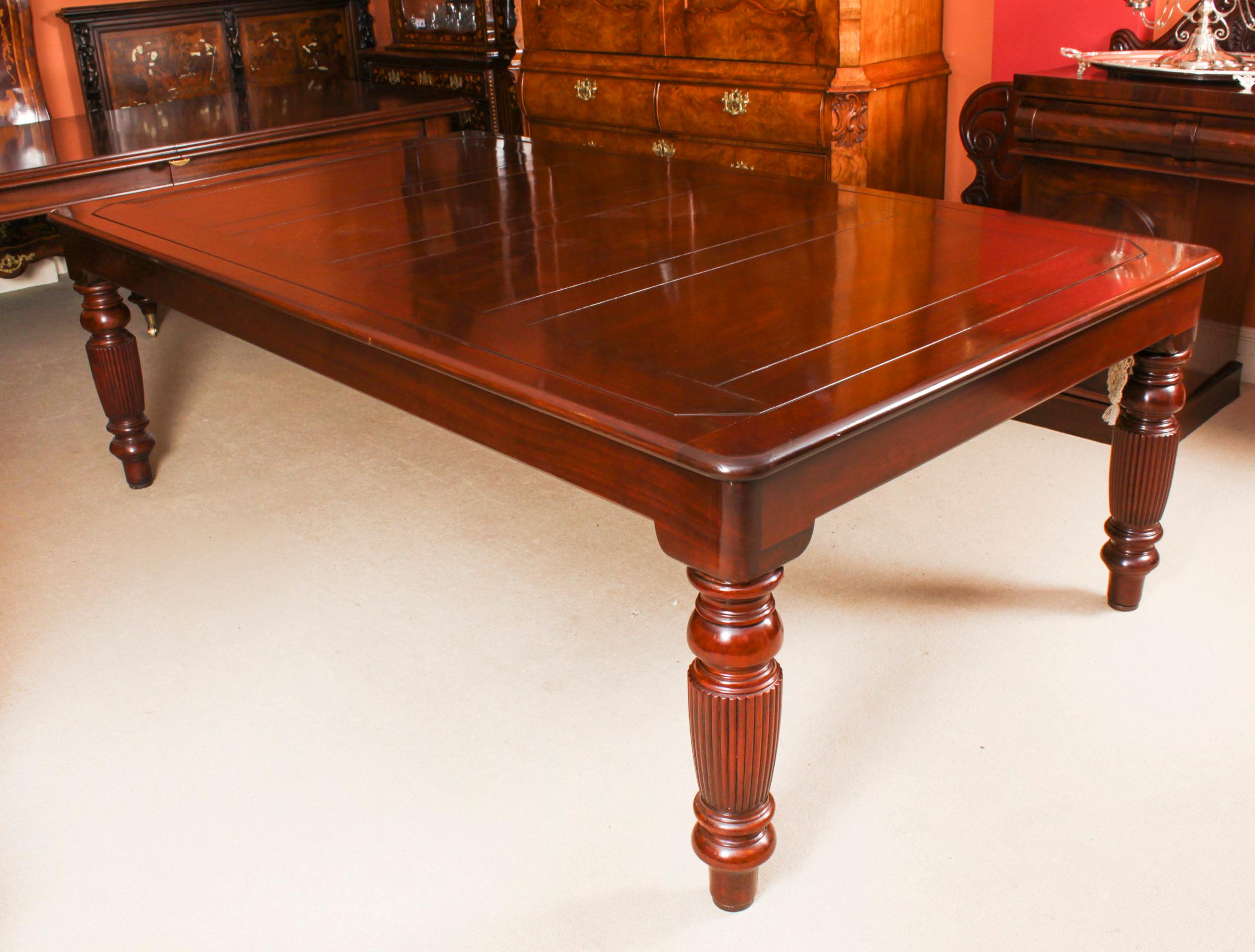A superb antique Victorian revolving mahogany billiards table/dining table, in the manner of Riley, and the matching set ten Chippendale Revival dining chairs, all  dating from Circa 1880.

The oblong top rotating on a central axis to reveal a