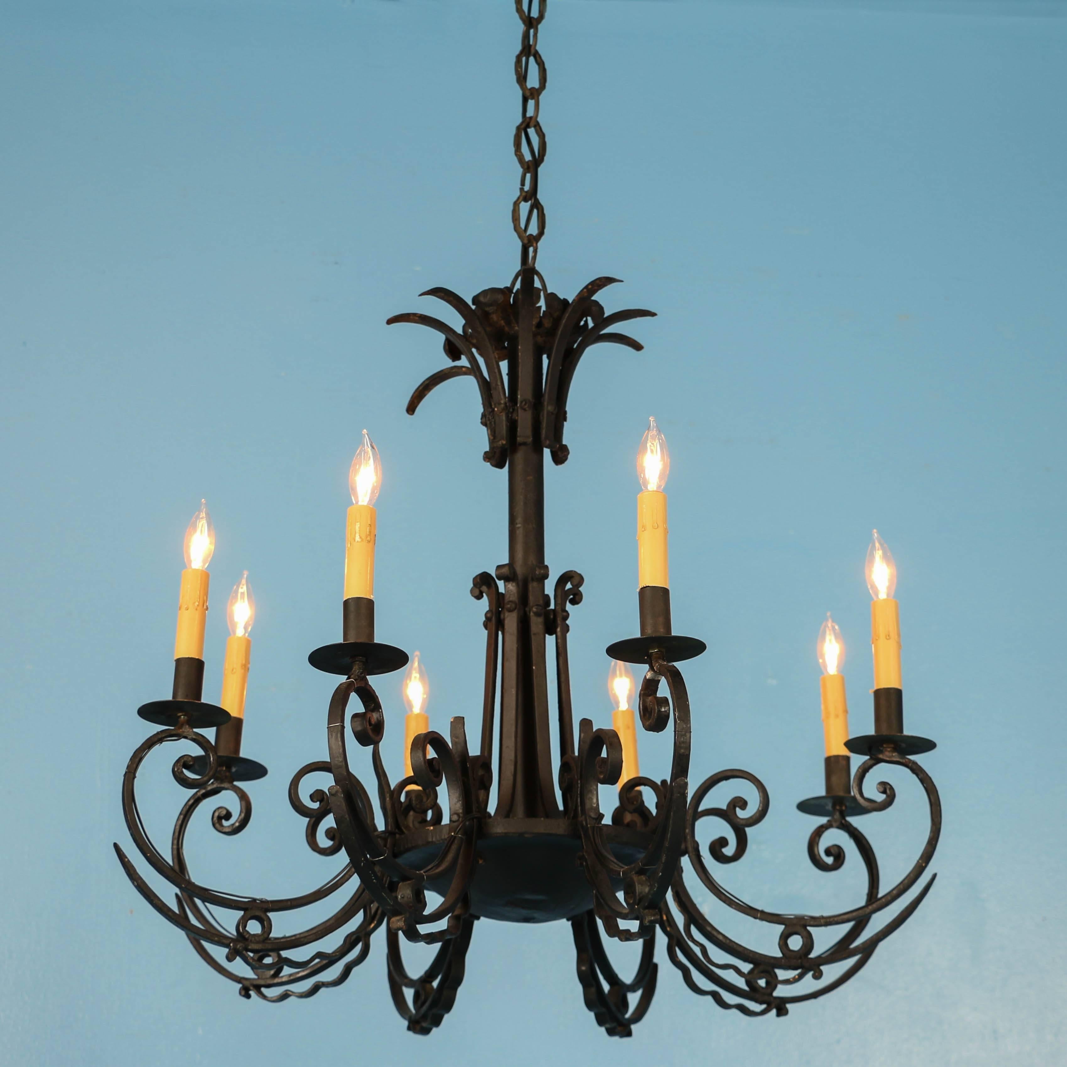 French Antique Eight-Light Scrolled Black Iron Chandelier