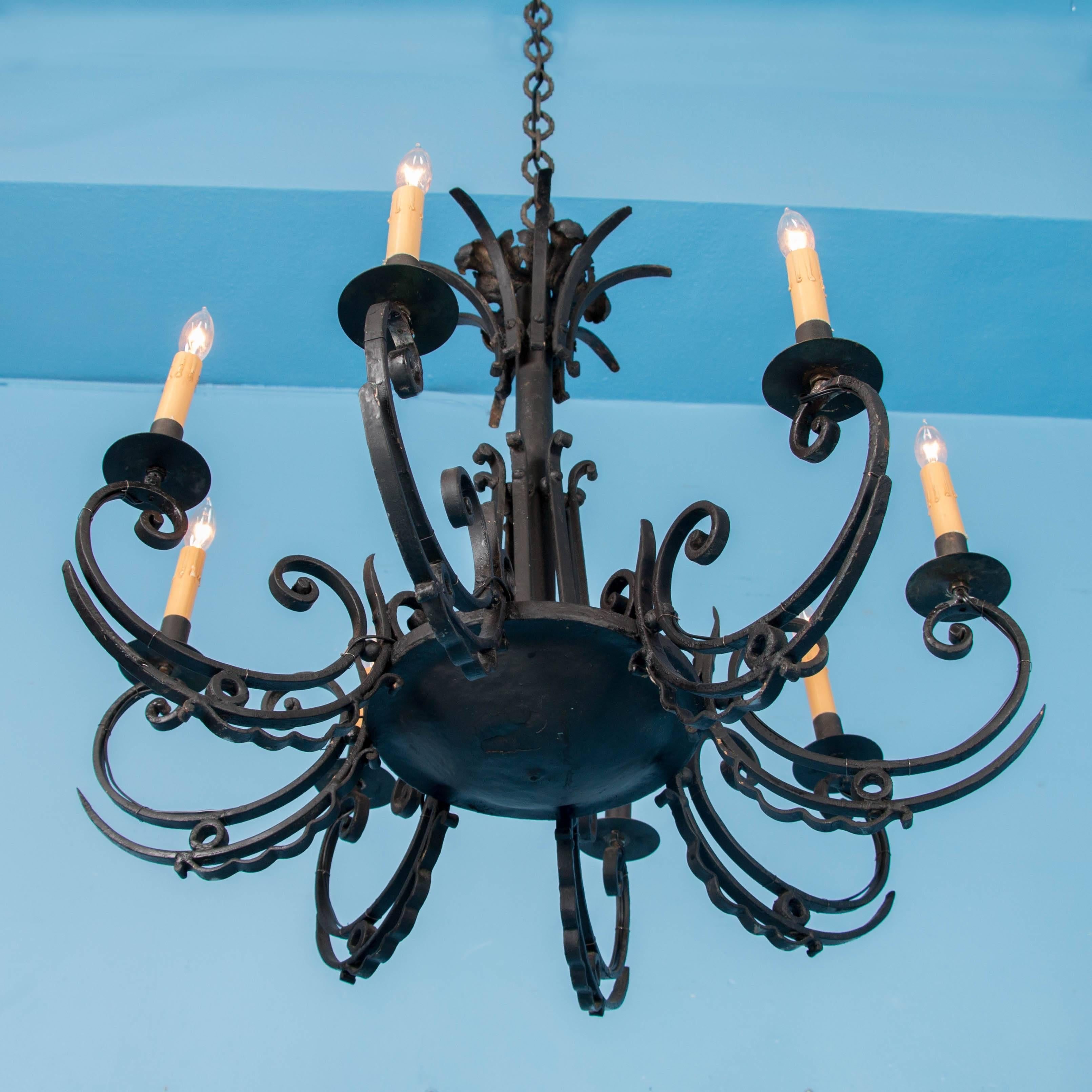 Antique Eight-Light Scrolled Black Iron Chandelier In Good Condition In Round Top, TX