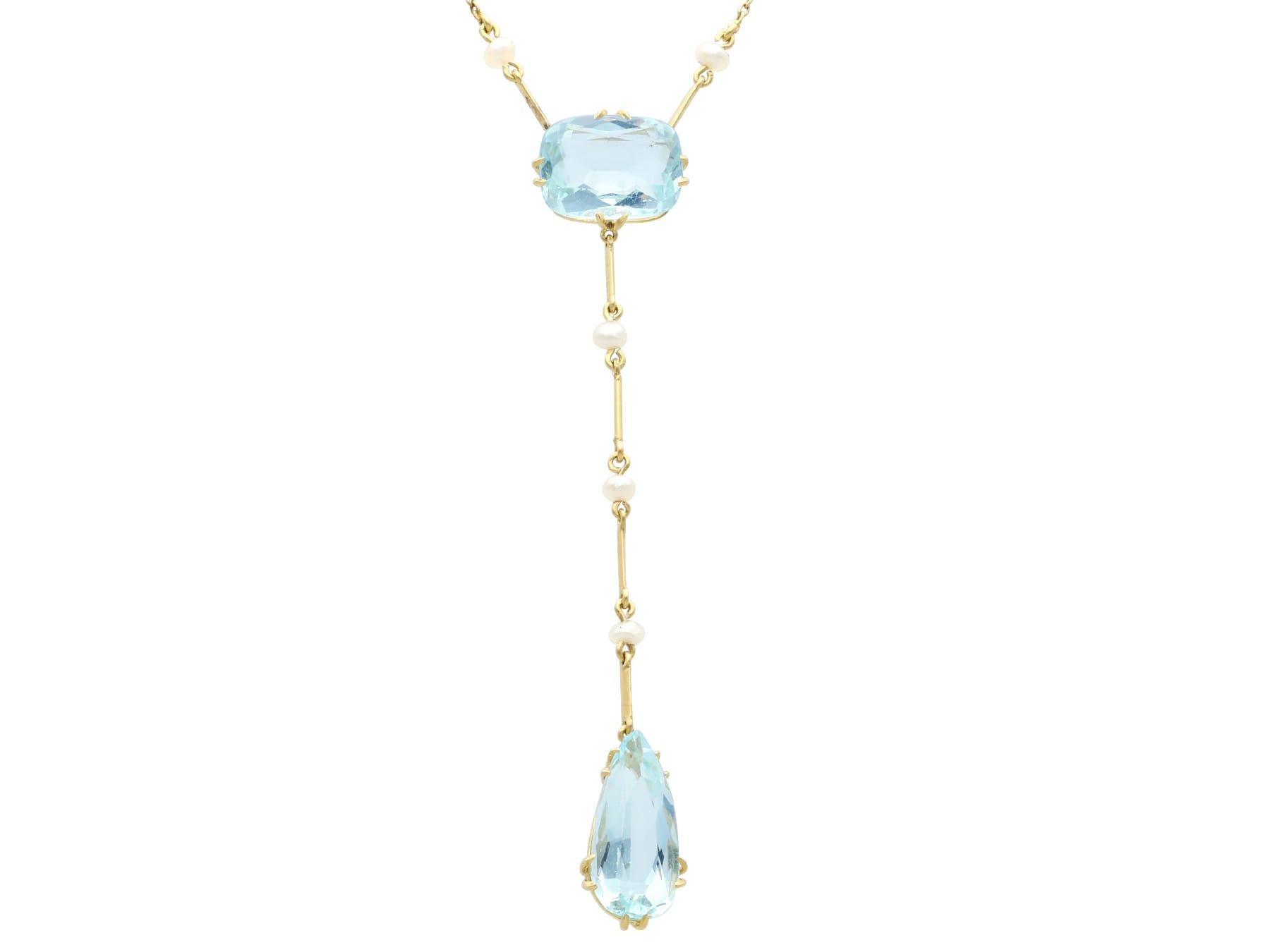 A stunning, fine and impressive antique 8.33 carat aquamarine, pearl and 15 carat yellow gold pendant - boxed; part of our diverse antique jewellery and estate jewelry collections

This stunning antique pendant has been crafted in 15ct yellow