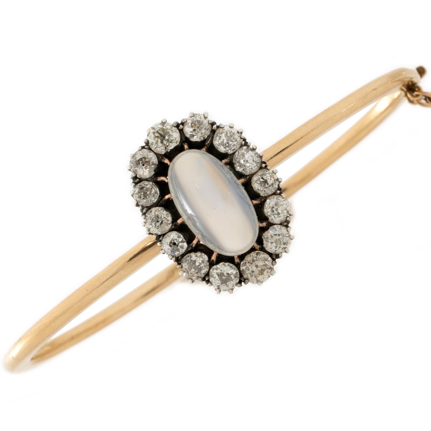 A very special antique bracelet and ring combination piece. The featured moonstone is exceptional and deserving of multiple ways of wearing it, ergo, the modular design of the moonstone's setting allows it to be removed and placed in either it's