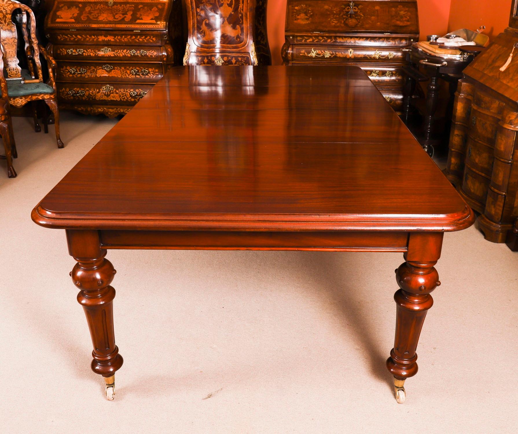 This is a magnificent antique Victorian solid mahogany wind out dining table which can seat ten diners in comfort, it dates from Circa 1870.

This beautiful table is in stunning flame mahogany and has two leaves of approx fifty cm each, which can be