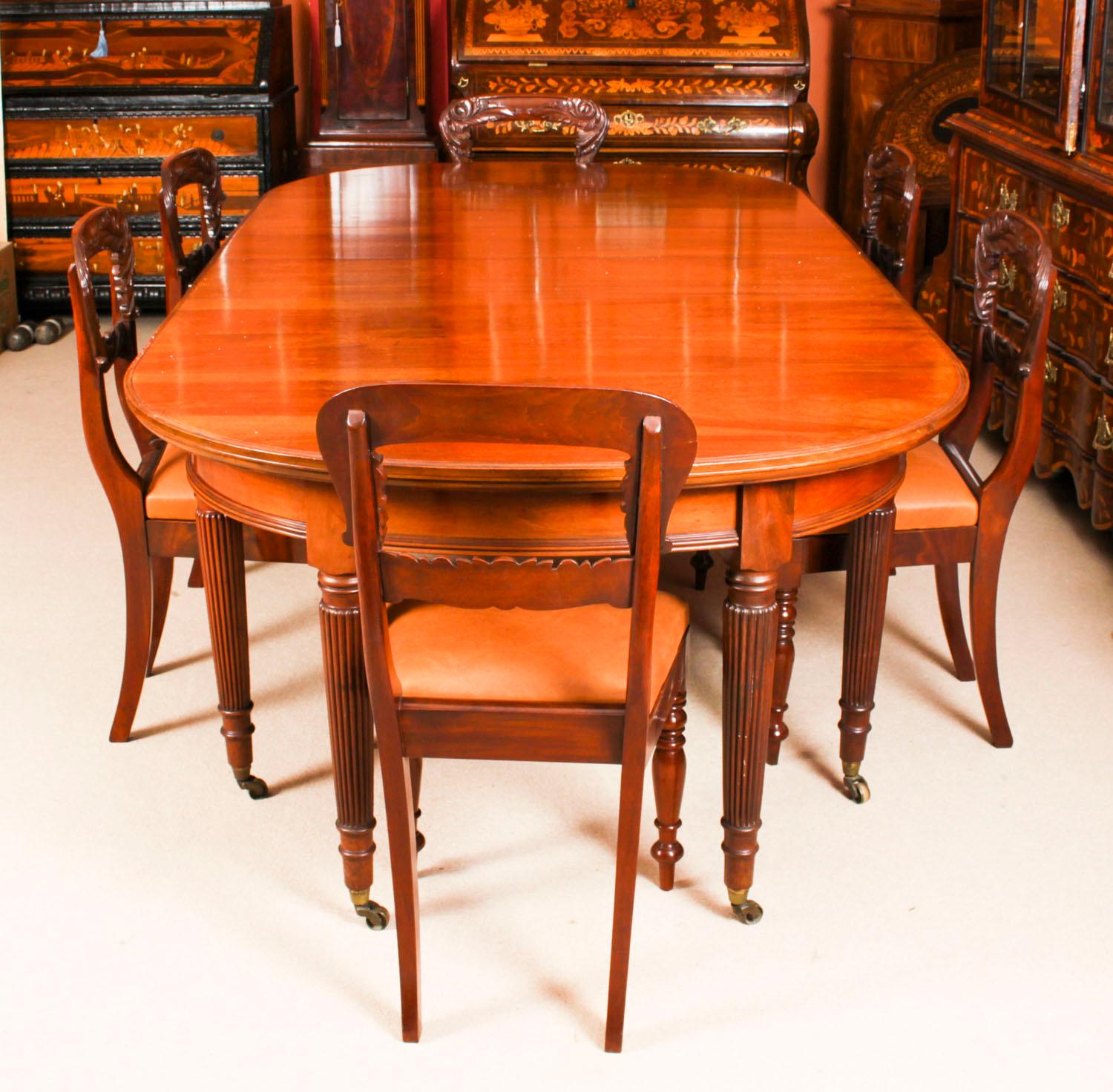 This is a fabulous antique 19th century dining suite comprising a Victorian oval flame mahogany extending dining table, circa 1880 in date and a set of six antique William IV dining chairs Circa 1830 in date.

The table has two original leaves and